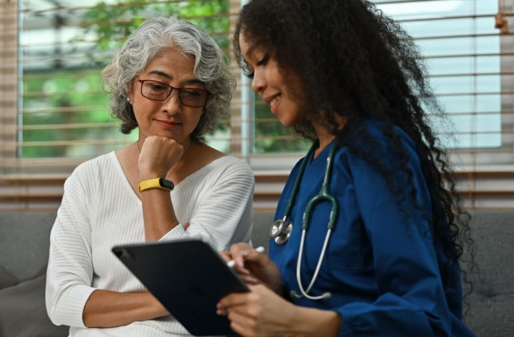 An older adult talks with their doctor about their intimate health.